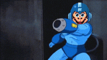 a pixelated image of a video game character with a helmet that says ' mega man ' on it
