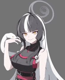 a girl with long black and white hair is holding a snake in her hand .
