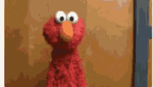 Shrug Elmo GIF - Shrug Elmo GIFs