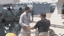 He Was Not Careful Enough, Clearly GIF - Newsbloopers Overboard Cord GIFs