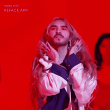 a man with blonde hair and a beard is wearing a bra