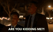 a man in a suit says " are you kidding me ? "