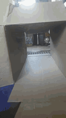 a cardboard box with a reflection of a kitchen