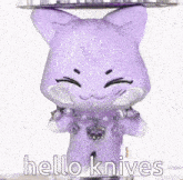 a purple stuffed cat with the words hello knives written on it