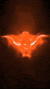 a glowing orange bird is flying through the air