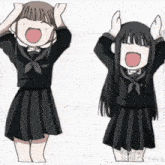 two girls in school uniforms with their hands in the air