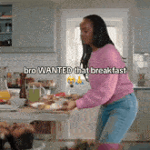a woman in a pink sweater is preparing breakfast in a kitchen and the caption says bro wanted that breakfast