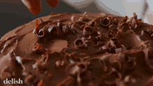 Chocolate Topping Chocolate Shavings GIF - Chocolate Topping Chocolate Shavings Chocolate Cake GIFs