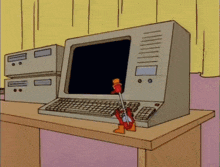 a cartoon character is holding a screwdriver in front of a computer screen