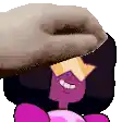 a person is petting a cartoon character 's head with a hat .