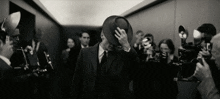 Oppenheimer Walking Through The Press With Their Cameras Oppenheimer Movie GIF