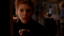 a woman with the name amber benson on her top