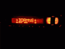 a car radio displays the words + dormne + on the screen