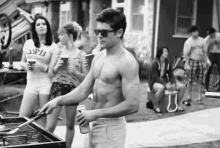 It'S Getting Hot In Here GIF - Zac Efron Bbq GIFs