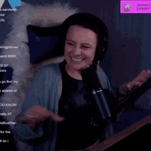 a woman wearing headphones stands in front of a microphone with the words january stream on the bottom right