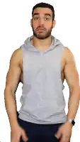 a man with a beard is wearing a gray tank top with a hood