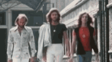 Walking Barry Gibb GIF - Walking Barry Gibb Robin Gibb GIFs
