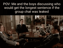 a group of men sitting around a table with a caption that says pov me and the boys discussing