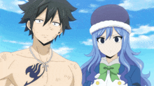 a man with a tattoo on his chest and a girl with blue hair