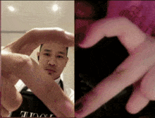 a man and a woman are making a heart with their hands