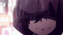 a close up of a person wearing a hoodie with a hood on their head .