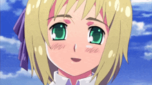 a little girl with blonde hair and green eyes looks at the camera