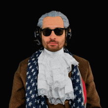 a man wearing a wig and sunglasses has a scarf around his neck that looks like an american flag