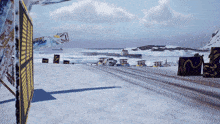 a snowy landscape with a sign that says ' a ' on it