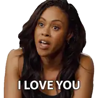 a woman says " i love you " in a black tank top