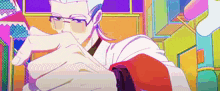 a man with glasses is holding a piece of paper in his hand in a colorful room .