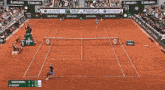 a tennis court with emirates and bnp paribas ads on the sidelines