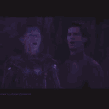 two men in spiderman costumes are standing next to each other and one of them is saying i 'm peter by the way .