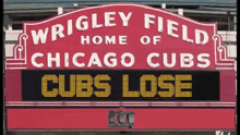 wrigley field home of the chicago cubs has a scoreboard that says cubs lose