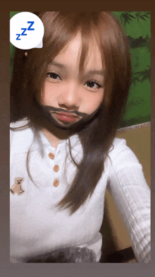 a little girl with a beard on her face has a speech bubble that says zzz
