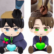 two dolls are sitting next to each other holding hearts