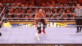 Roman Reigns Cody Rhodes GIF - Roman Reigns Cody Rhodes Slam GIFs