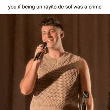 a man singing into a microphone with a caption saying you if being un rayito de sol was a crime