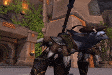 a video game character is wearing a hat and holding a stick