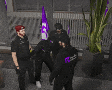 a group of police officers are standing around a man in a purple shirt that says ' saudi arabia ' on it