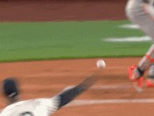 a blurry picture of a baseball player trying to catch the ball