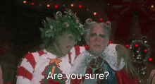 a grinch and a man are standing next to each other and grinch is asking if the man is sure