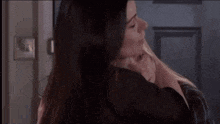 two women hugging each other with the words i love you in the corner
