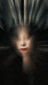 a painting of a woman with long dark hair and red lips