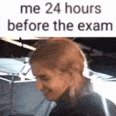 a woman is smiling in front of a sign that says " me 24 hours before the exam "