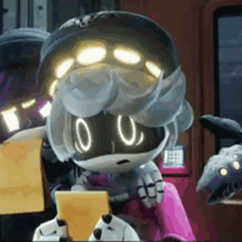a robot with glowing eyes is holding a yellow piece of paper