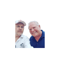 two men posing for a picture with one wearing a shirt that says st. the