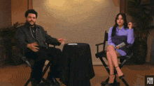 a man and a woman are sitting at a table with the word complex on the bottom