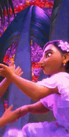 a woman in a purple dress is holding a child 's hand in front of a purple background .