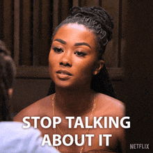 a picture of a woman with the words stop talking about it below her