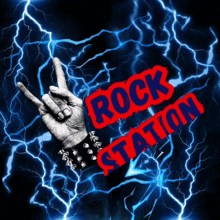 a sign that says rock station with a hand making a horns sign